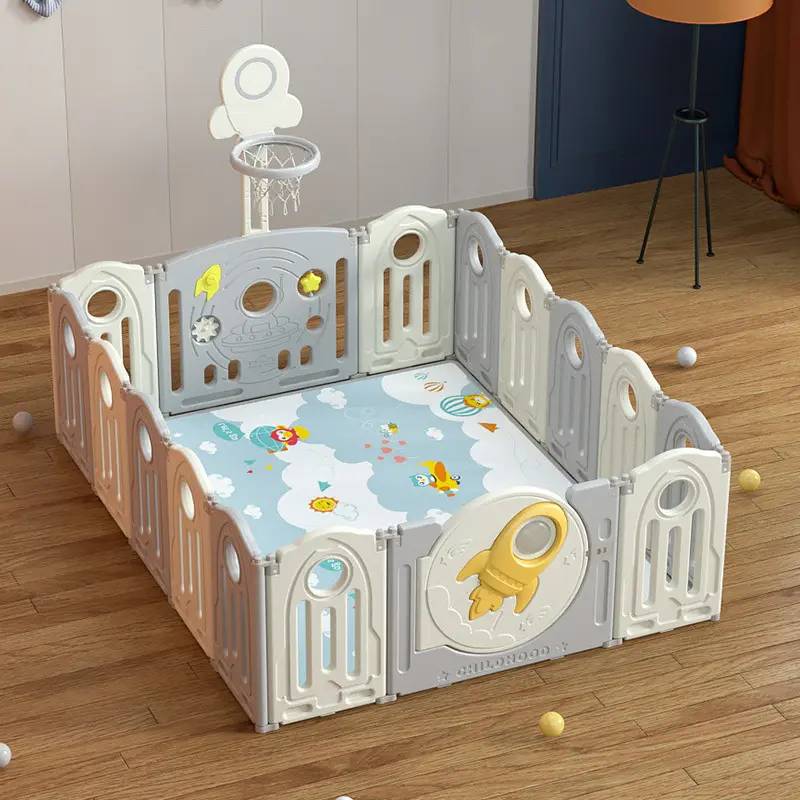 Parc pour bébé pliable en PEHD, motif fusée, avec panier de basket, pour une sécurité optimale des tout-petits.